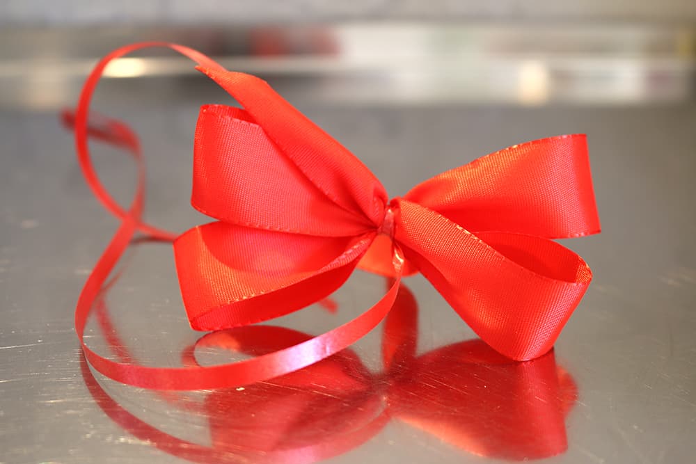 geschenkverpackung-schleife-rot-s Geschenkschleife, rot